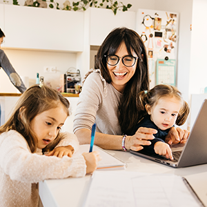 Parent doing homework with children