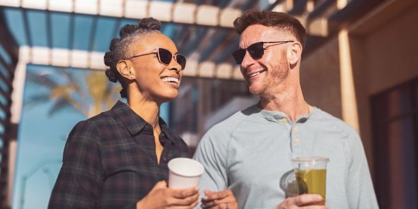 man and woman wearing sunglasses outdoors