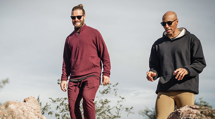 Men hiking wearing SunSync Light-Reactive Lenses