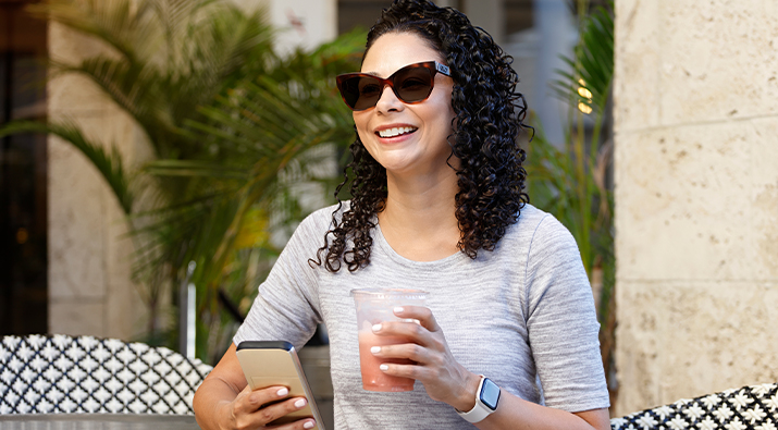 SunSync Light-Reactive Lenses provide blue light defense outdoors from sun and digital devices